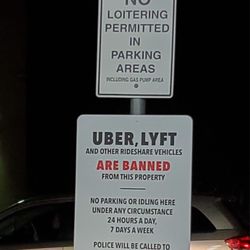 Shell - Posted signage of ban for rideshare vehicles on property.