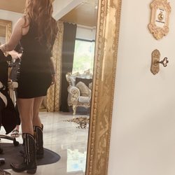 Blondee Beauty Parlor - The owner!  Her boots were made for walkin'... literally for hours!
