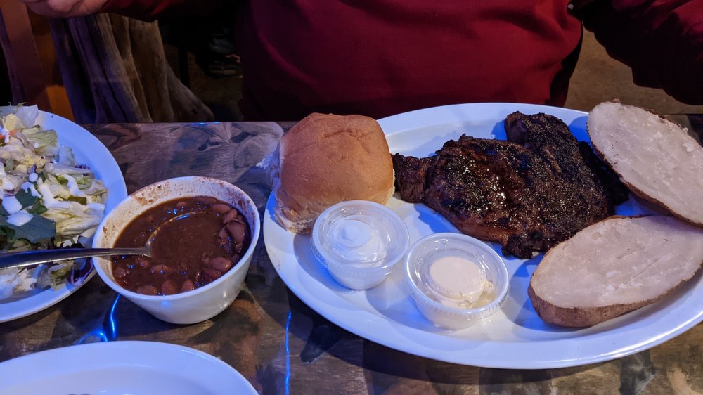 Cadillac Chaparral Steakhouse & Saloon Logo