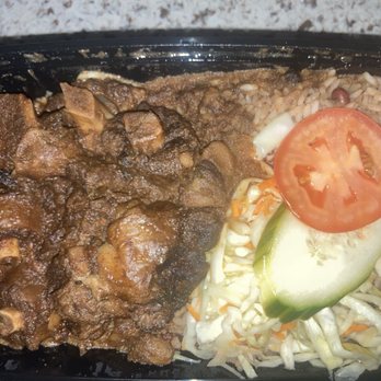 Jumieka Grand - Lunch menu - oxtails w/rice n peace. Good flavors combined with the coleslaw salad. - Seafood Near Me - New York, New York