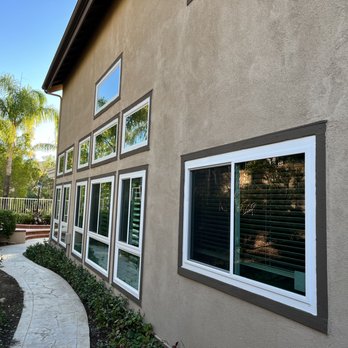 American Vision Windows - The end result of one side of the house. This is a combination of sliders and picture windows. - Windows Installation Near Me - Tustin, California American Vision Windows - The end result of one side of the house. This is a combination of sliders and picture windows. - Windows Installation Near Me - Tustin, California