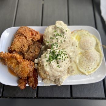 Ruby Sunshine Homewood - Biscuits & Gravy with added "Sweet Heat Style" fried chicken - Breakfast & Brunch Near Me - Birmingham, Alabama Ruby Sunshine Homewood - Biscuits & Gravy with added "Sweet Heat Style" fried chicken - Breakfast & Brunch Near Me - Birmingham, Alabama