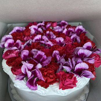 Alebrijes Bakery - Tres Leches all white. Added wild flowers from Trader Joe's! - Bakeries Near Me - Rancho Cucamonga, California