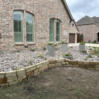 Pristine Landscaping and Lighting. - New flower bed with river rock and new plants! - Landscaping Near Me