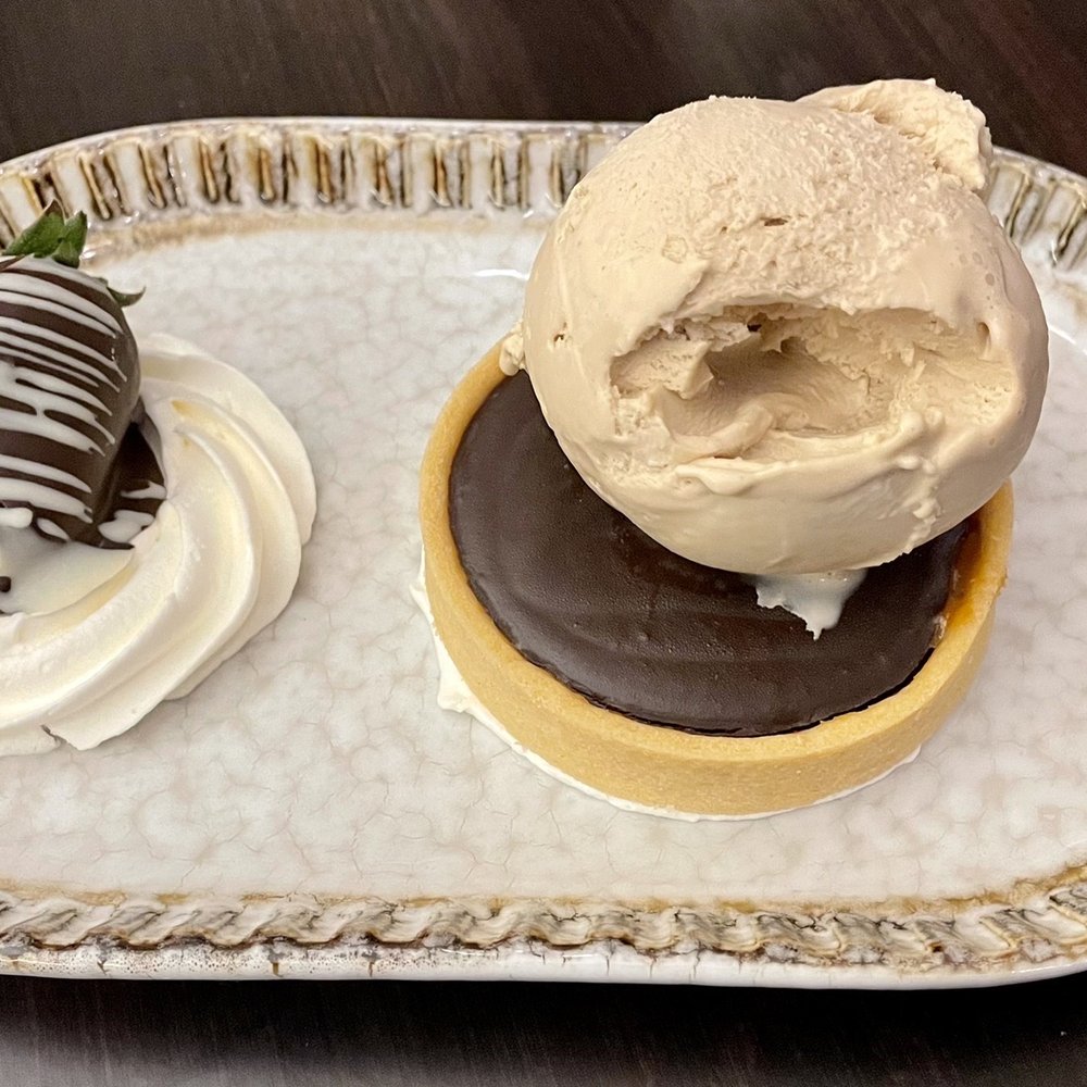 Carmel chocolate tart with hazelnut gelato!!!! Carmel chocolate tart with hazelnut gelato!!!!