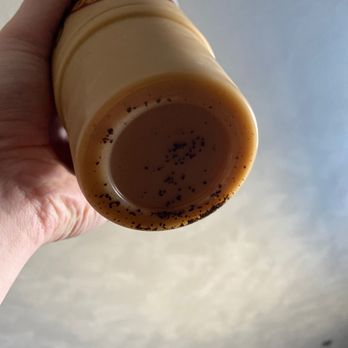 Heav'nly Donuts - a hand holding a coffee cup - Donuts Near Me - Wilmington, Massachusetts Heav'nly Donuts - a hand holding a coffee cup - Donuts Near Me - Wilmington, Massachusetts