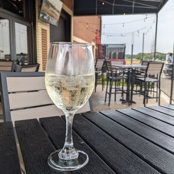 Jonathan's Grille - Vino on back patio - Sports Bars Near Me - Madison, Alabama
