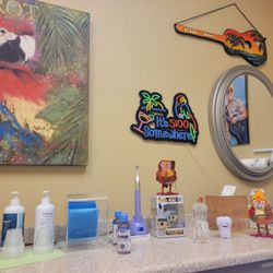Dentremont Dental Services - Doc just keeps making the rooms fresh and he is making me feel @ home with this Parrothead vibe. 10/14/26