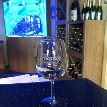 Alapay Cellars - The cool tropical fish tank that adds to the ambiance. - Wineries Near Me - Avila Beach, California