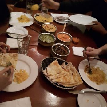 The Kathmandu Cottage - garlic naan, saffron basmati rice, butter chicken, saag paneer, veggie korma, and eggplant curry - Indian Near Me - West Melbourne, VIC