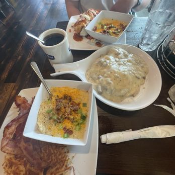 Canopy Road Cafe - Biscuits with Gravy, Loaded Grits, and Hashbrowns with Bacon - Breakfast & Brunch Near Me - Tallahassee, Florida Canopy Road Cafe - Biscuits with Gravy, Loaded Grits, and Hashbrowns with Bacon - Breakfast & Brunch Near Me - Tallahassee, Florida
