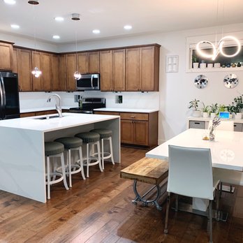 ProGranite Surfaces - a kitchen with a center island - General Contractors Near Me - Mukilteo, Washington ProGranite Surfaces - a kitchen with a center island - General Contractors Near Me - Mukilteo, Washington