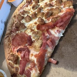 a slice of pizza in a box a slice of pizza in a box