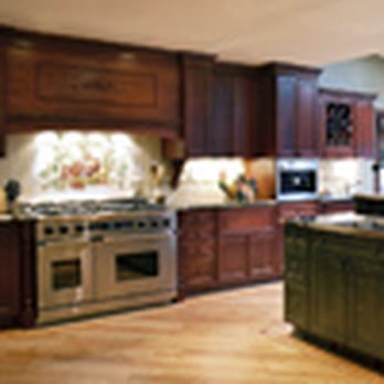 Dwellings LLC - A traditional kitchen using cherry wood and a custom finish on the island. - Interior Design Near Me - Bradley Beach, New Jersey