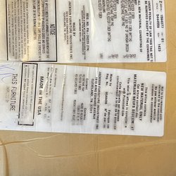 Skipper's Furniture - Manufacturers label that leaks ink onto the cushions.