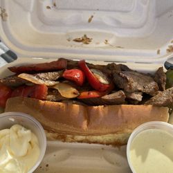 Coast 2 Coast Caterers - Steak sandwich with peppers and onions.