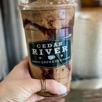Cedar River Espresso - a hand holding a cup of espresso - Coffee & Tea Near Me - Renton, Washington