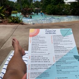 a person reading a menu