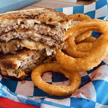 The Burger Joint - Added onion rings for $2 more than tots or fries on the side. Very crispy, not greasy. - Burgers Near Me - Parma, Idaho The Burger Joint - Added onion rings for $2 more than tots or fries on the side. Very crispy, not greasy. - Burgers Near Me - Parma, Idaho