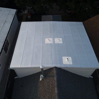 Anchor Point Roofing - Transforming Roofs, Radiating Beauty: Behold the Spectacular Results of Our Team's Skillful Modified Bitumen Replacement. - Roofing Near Me - Chicago, Illinois