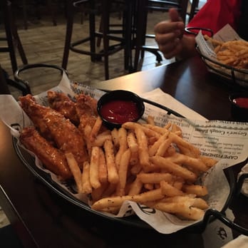 Peck & Pour - Spicy garlic Parmesan wings with fries - Chicken Wings Near Me - Norfolk, Virginia Peck & Pour - Spicy garlic Parmesan wings with fries - Chicken Wings Near Me - Norfolk, Virginia