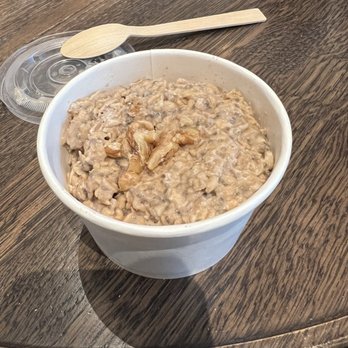 Good Coffee - a bowl of oatmeal on a table - Coffee & Tea Near Me - Portland, Oregon Good Coffee - a bowl of oatmeal on a table - Coffee & Tea Near Me - Portland, Oregon