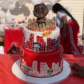 Desserts by Dana - a cake with a man on top - Bakeries Near Me - Newark, Delaware