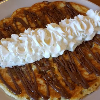Seven Mile Cafe - Banana walnut pancake with Nutella drizzle. Yum! - Breakfast & Brunch Near Me - Keller, Texas Seven Mile Cafe - Banana walnut pancake with Nutella drizzle. Yum! - Breakfast & Brunch Near Me - Keller, Texas