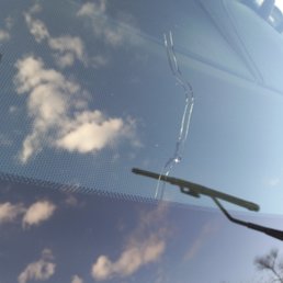 Broken windshield they sold me and now refuse to repair it after they told me satellite would come to my house to repair