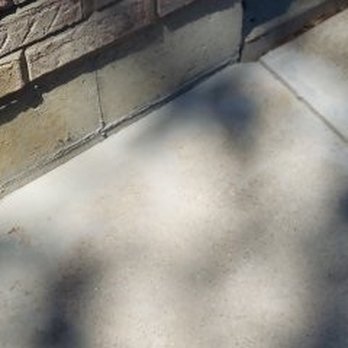 Woods Basement Systems - Can see where the cement was and how far the pier has moved. - Waterproofing Near Me - Collinsville, Illinois