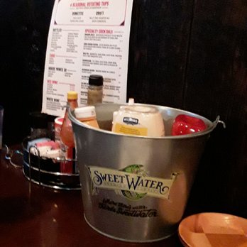 Swampwater Grill - Table condiments. - Cajun/Creole Near Me - Cincinnati, Ohio