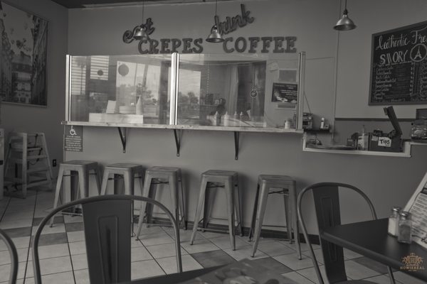 Photo of La Creperie - San Diego, CA, US. Like an old timey interior
