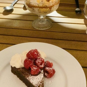 Aquavit - Sea buckthorn ice cream sundae (far side) Kladdkaka (near photo) - Scandinavian Near Me - New York, New York Aquavit - Sea buckthorn ice cream sundae (far side) Kladdkaka (near photo) - Scandinavian Near Me - New York, New York