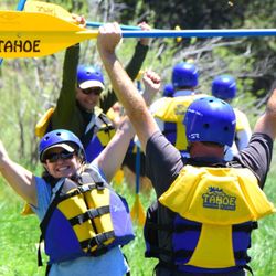 Tahoe Whitewater Tours - Happy rafters heading to the river!