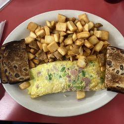 The Diner - Western omelette with raisin toast and home fries
