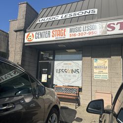 Center Stage Music Center - Go here and take piano lessons and say can my teacher be Smeir and say i want to take electric guitar lessons and say can my teacher be Al.
