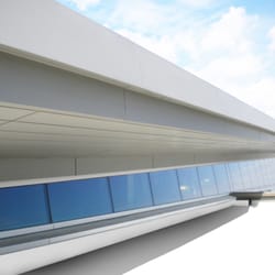 Triumph - Aluminum Composite Panels and Zinc Cladding work done by Triumph Roofing Inc