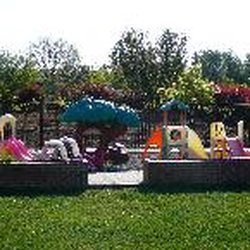 Harvest House Childcare - Our riding area and orchard