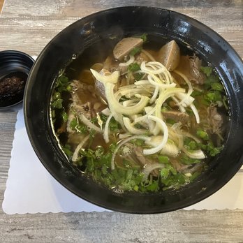 PHO 100 - Pho with brisket, meatball and extra white onion. Side of chili garlic sauce. - Vietnamese Near Me - Moorpark, California