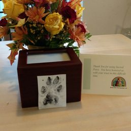 My dog who passed in one of the urns you can purchase. They included a note and various paw prints of his. My dog who passed in one of the urns you can purchase. They included a note and various paw prints of his.