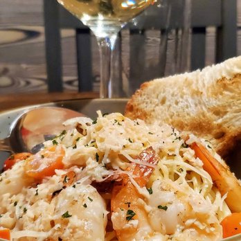 Social52 - a bowl of pasta with shrimp and carrots - New American Near Me - Richmond, Virginia