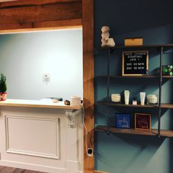 Blue Lotus Massage & Spa - Our new shelf next to the front desk! There's always something new being set up in the office!