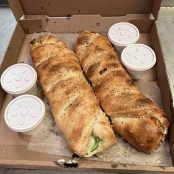 Troy's Pizzeria - Stromboli's - Pizza Near Me - Port Saint John, Florida Troy's Pizzeria - Stromboli's - Pizza Near Me - Port Saint John, Florida