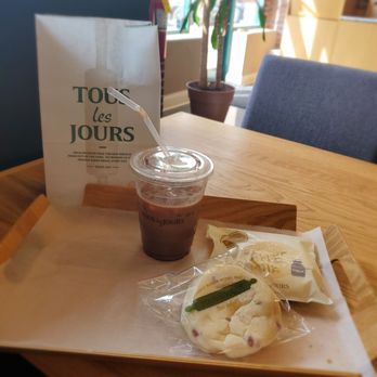 Tous Les Jours - Iced mocha, milk bread, cranberry apple cream cheese bread. - Coffee & Tea Near Me - Naperville, Illinois