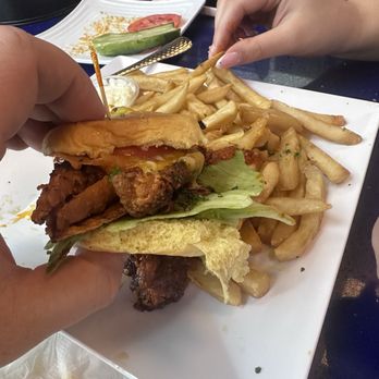 Hector's Bistro - Nashville Crispy Chicken Sliders - Burgers Near Me - South Amboy, New Jersey Hector's Bistro - Nashville Crispy Chicken Sliders - Burgers Near Me - South Amboy, New Jersey