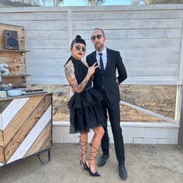 My wife and I, with me wearing the suit made for me by Bespoke Mr James