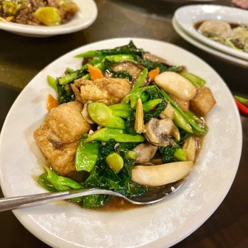 Peking Garden - a plate of food on a table - Chinese Near Me - Saint Paul, Minnesota