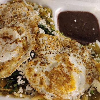 Latin World - Chilequiles with Salsa Verde, eggs and beans - Latin American Near Me - Toronto, Ontario Latin World - Chilequiles with Salsa Verde, eggs and beans - Latin American Near Me - Toronto, Ontario
