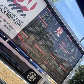 151 Coffee - a car parked in front of a sign - Coffee & Tea Near Me - Coppell, Texas