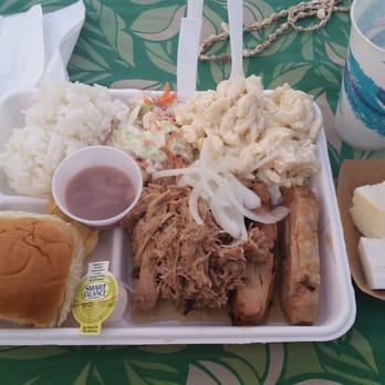 Germaine's Luau - Teri chicken, kalua pig hot out the ground, potato mac, carbs, and some poi. Put yourself into a polynesian coma. - Hawaiian Near Me - Kapolei, Hawaii Germaine's Luau - Teri chicken, kalua pig hot out the ground, potato mac, carbs, and some poi. Put yourself into a polynesian coma. - Hawaiian Near Me - Kapolei, Hawaii